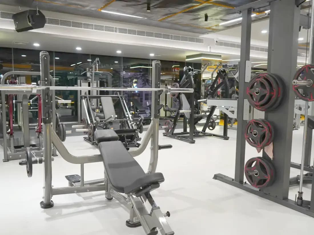 Squat racks and benches on the strength floor